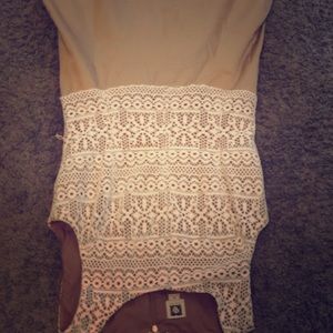 This khaki colored dress with off white accents